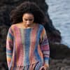 Häkelanleitung für den bunten Boho-Pullover mit Fransen von Lana Grossa Model in buntem Boho-Pullover mit Fransen von Lana Grossa