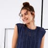 Kostenlose Strickanleitung für den Sommerpullunder von LANGYARNS Model in gestricktem Sommerpullunder von LANGYARNS